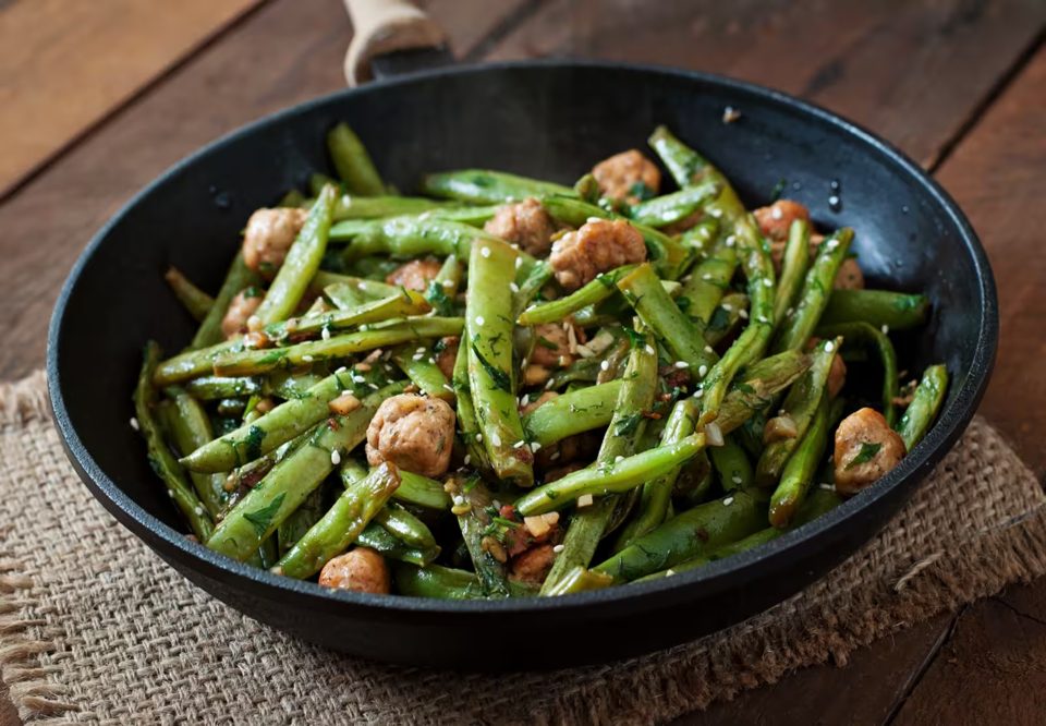 Asian-Style Green Beans Fried with Chicken Meatballs and Garlic