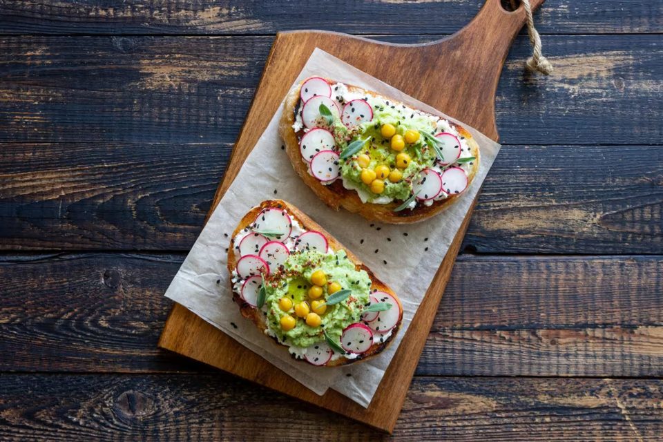Bruschetta with Guacamole, Radish, White Cheese, Chickpeas, and Sage
