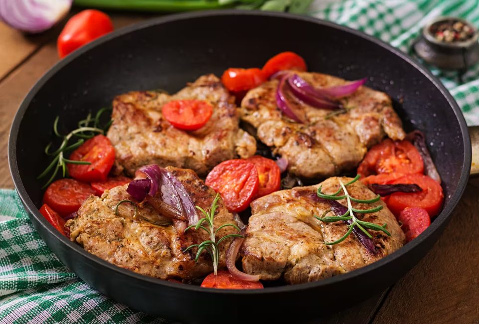 Juicy Pork Steak with Rosemary and Tomatoes
