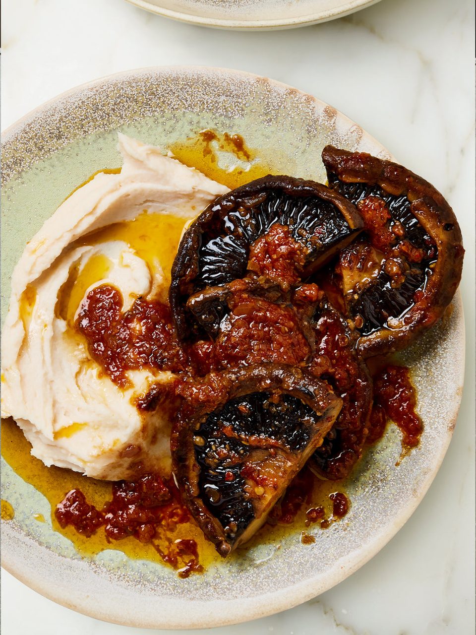 Portobello-steaks en puree van boterbonen