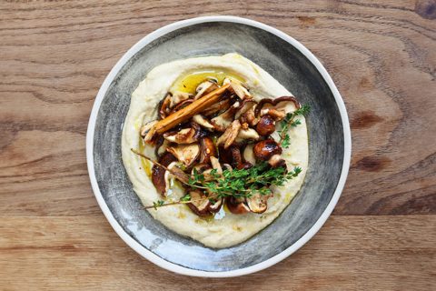 Marinated mushrooms hummus topping