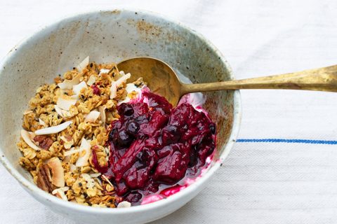 Pecan and coconut granola with roasted rhubarb and blackcurrants